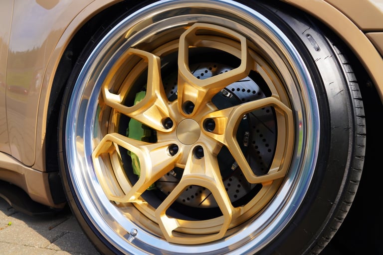 High-performance sports car wheel with racing brakes and alloy wheels showcasing precision engineering